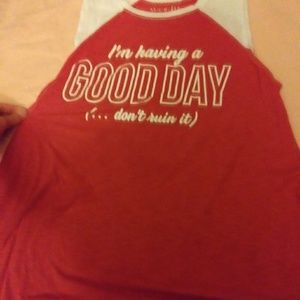 A red bathing suit cover